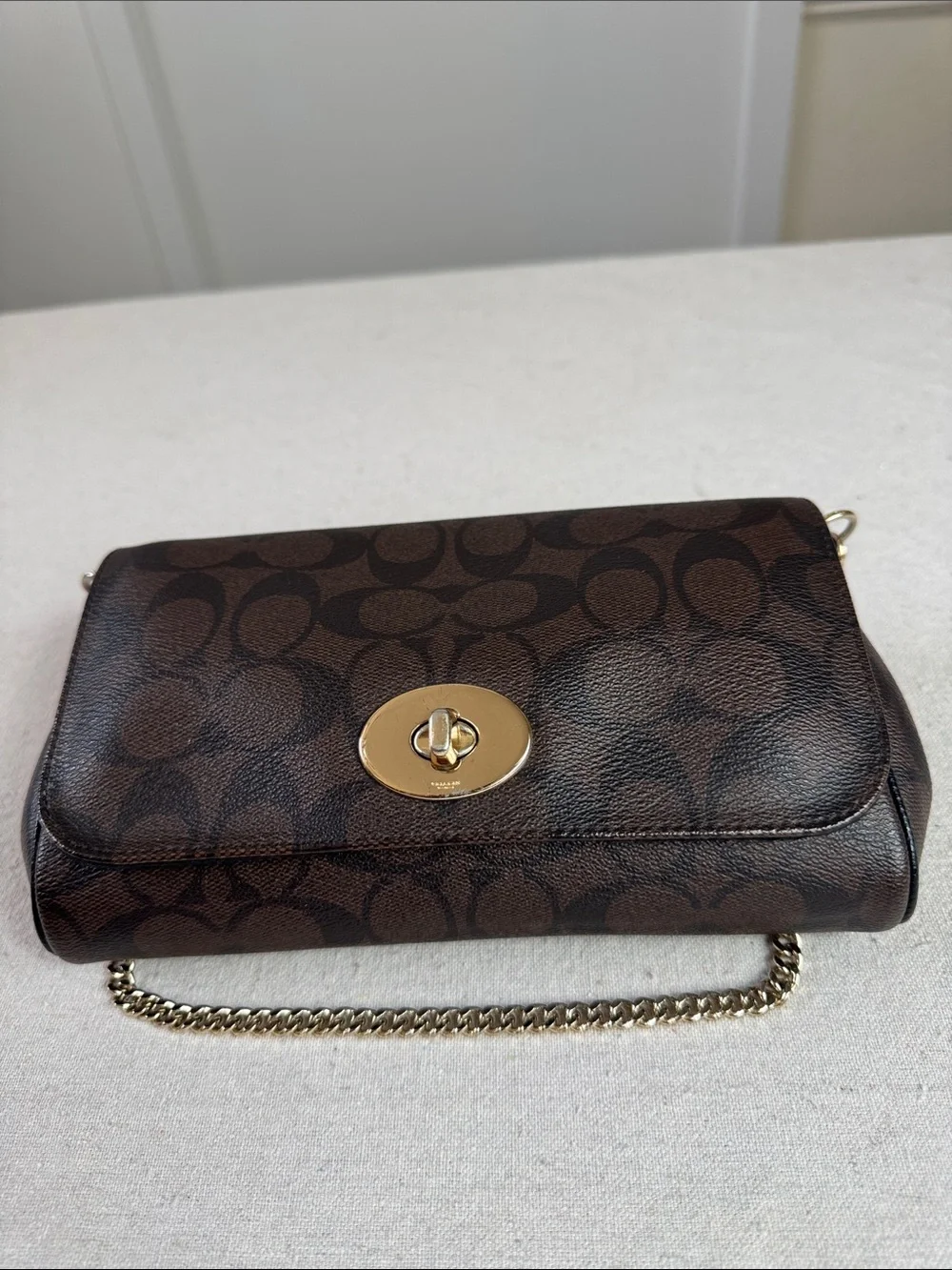 Coach Brown Signature Ruby Mini Crossbody with Gold Hardware bag.